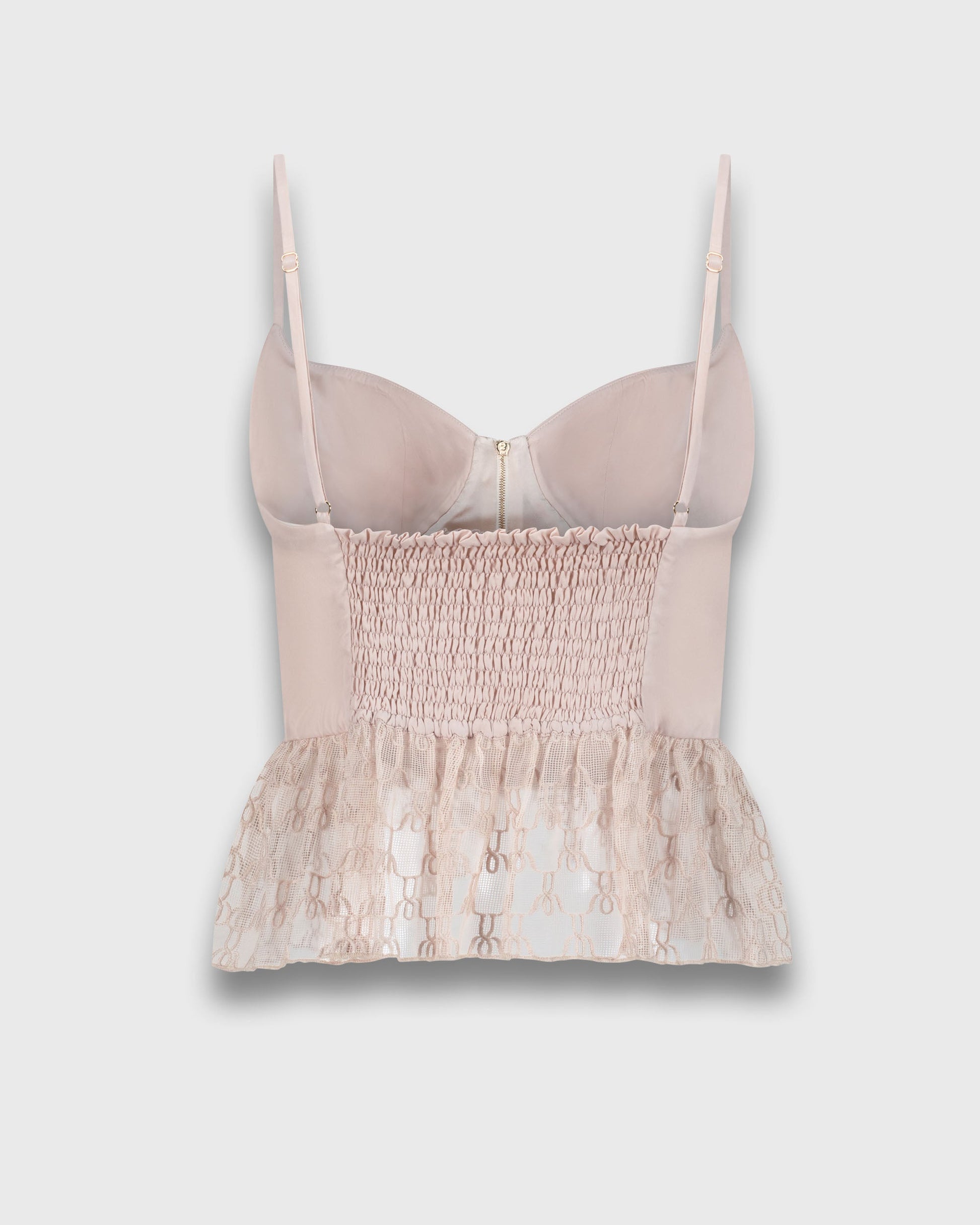 bralette with smocked top and lace trim on a light gray background
